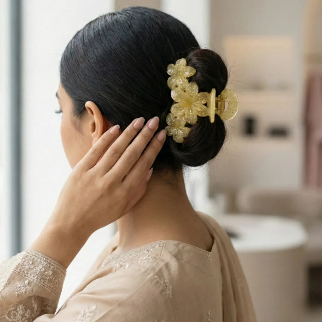 Transparent glitter flower hair claw with shimmering details for girls by Applique Threads.