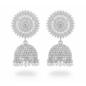 Close-up of pearl white crystal jhumkay with intricate gold-plated filigree and delicate white bead drops