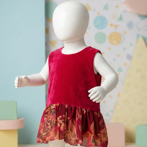 Front view of ruby red velvet bodice frock with floral print chiffon flare for toddler girls.
