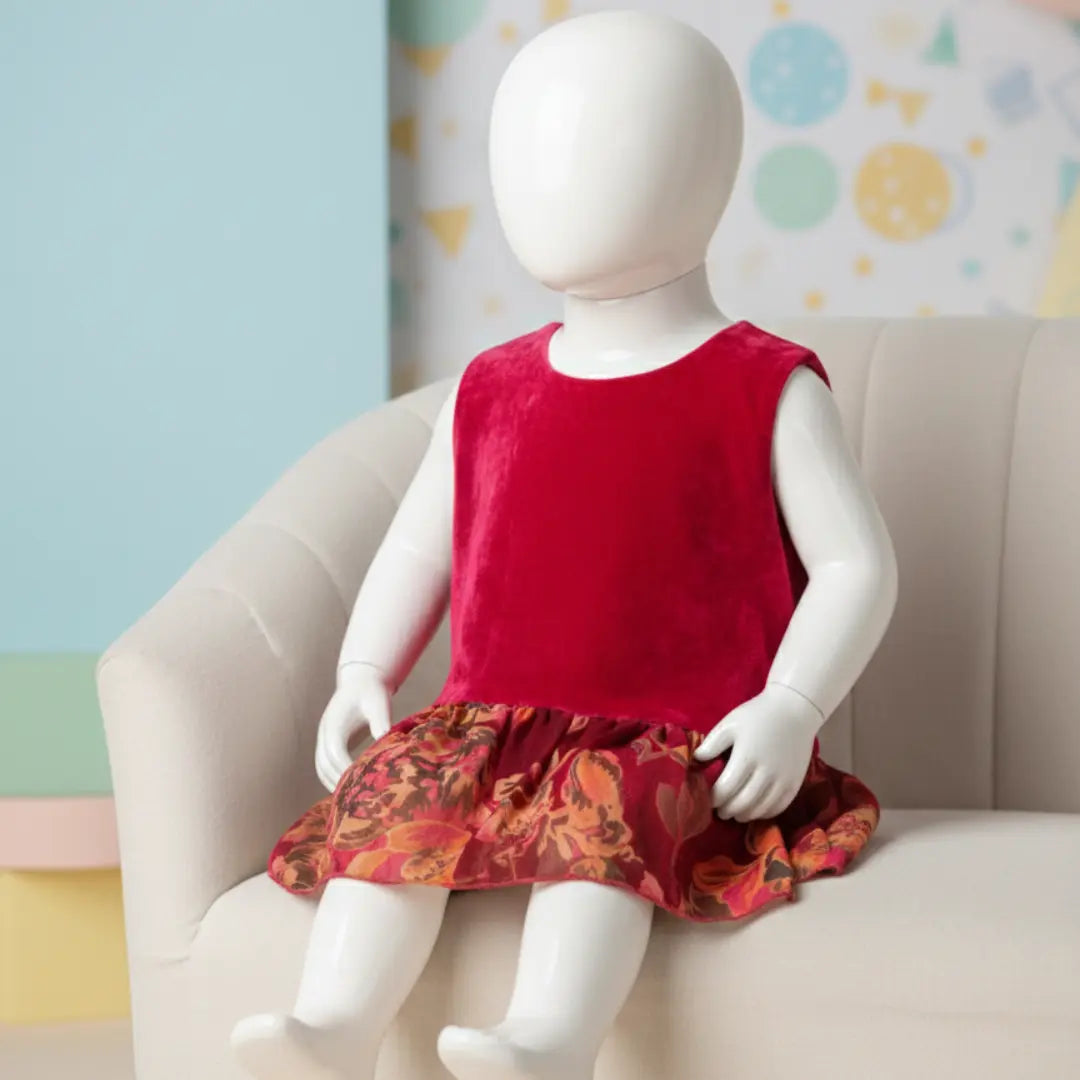 Close up of premium velvet bodice and floral chiffon pleats on girls fancy party dress.