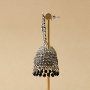 Back view of silver jhumka showing the secure push-back post and premium finish.