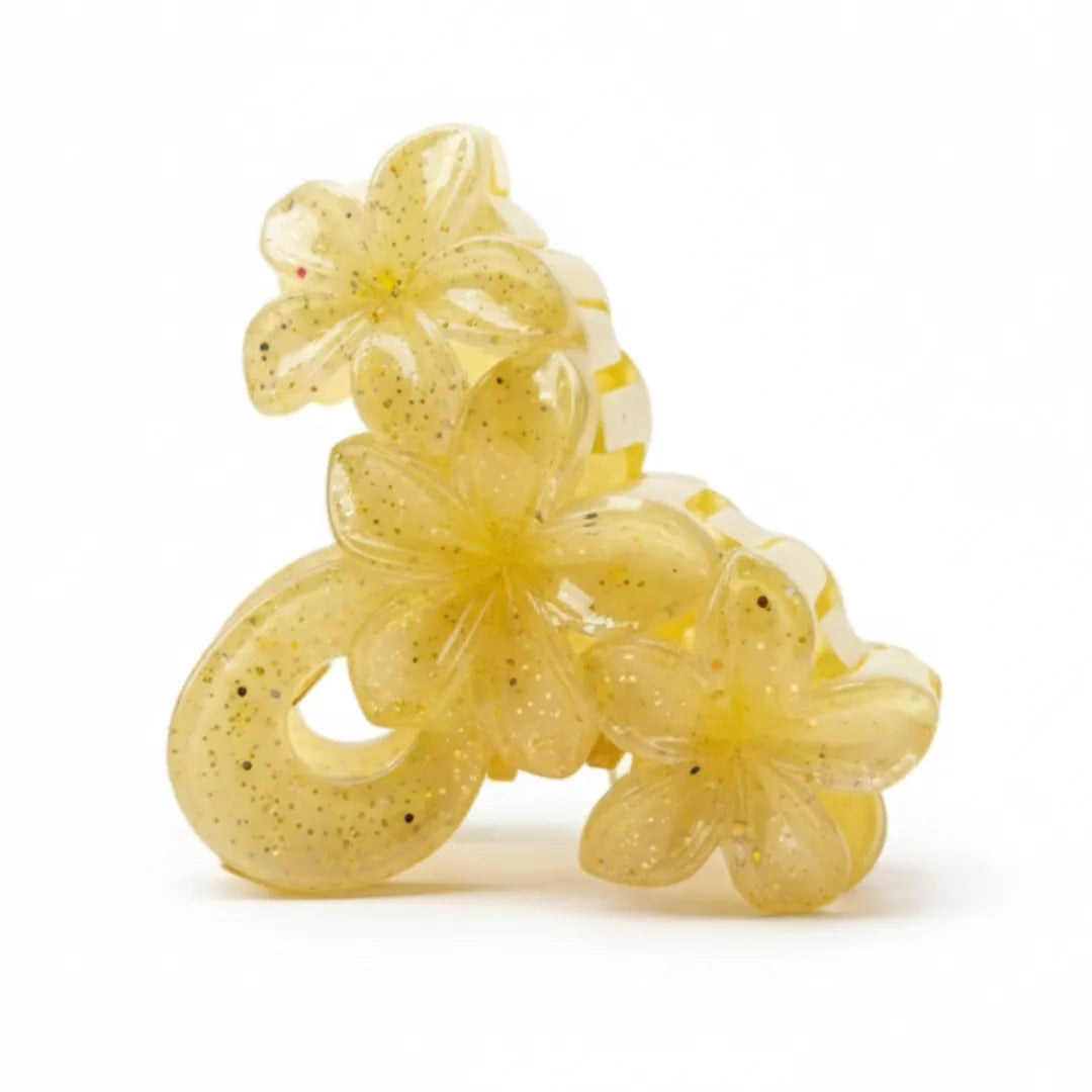 Transparent floral claw clip with embedded silver glitter for a sparkling, festive look — Applique Threads.