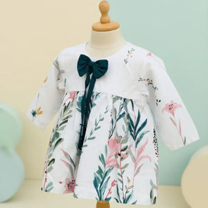 Elegant white and teal floral bow frock for girls by Applique Threads.