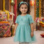 Front view of girls teal embellished dress with matching headband