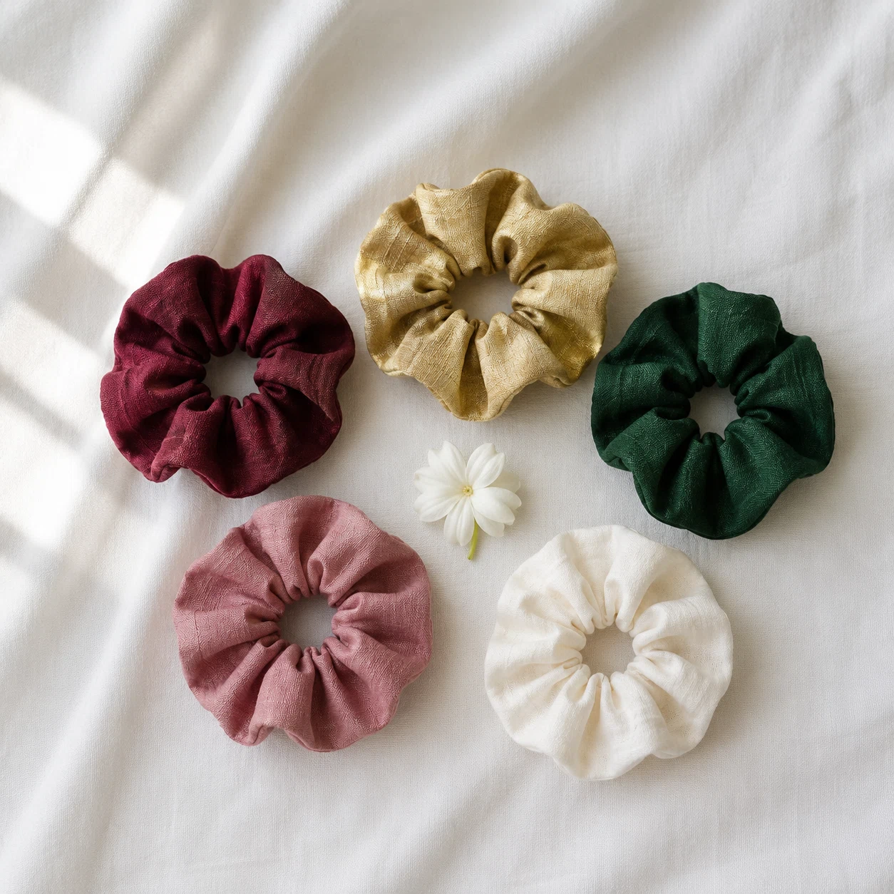 Fabric scrunchies Pakistan – five silk scrunchies in maroon, gold, bottle green, pink and ivory with jasmine flower by Applique Threads